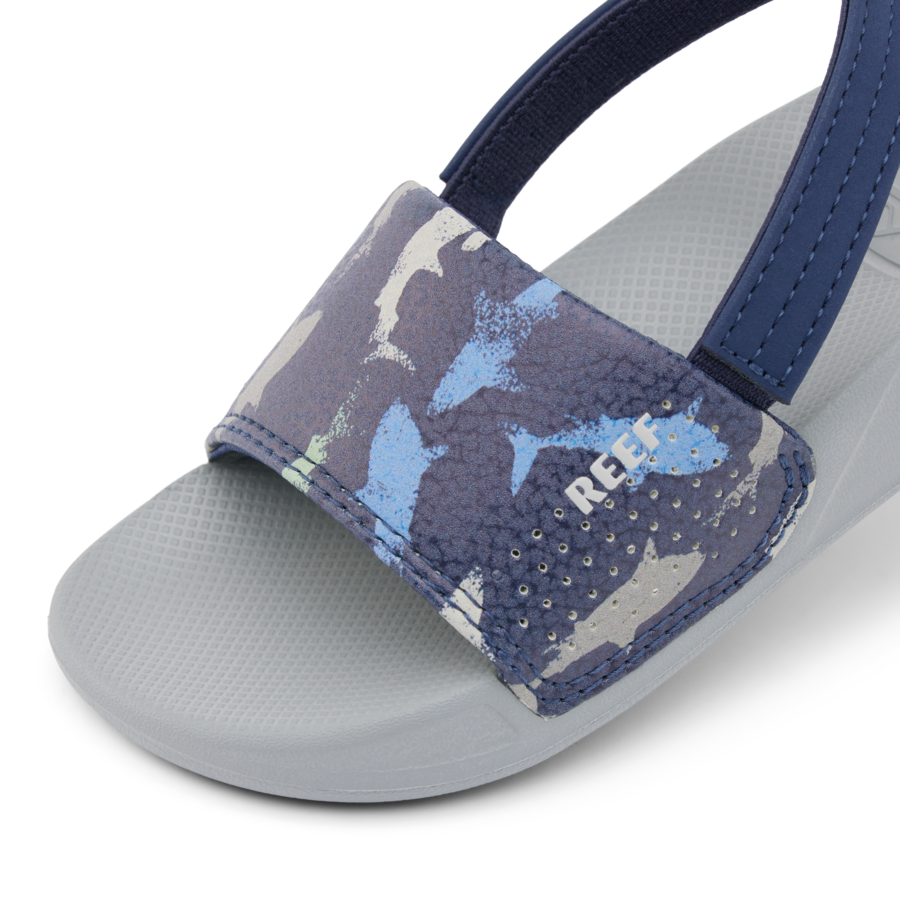 CJ6629_LITTE_ONE_SLIDE_NAVY_SHARK_DTL1_shadow-900x900-c4cc11b.png